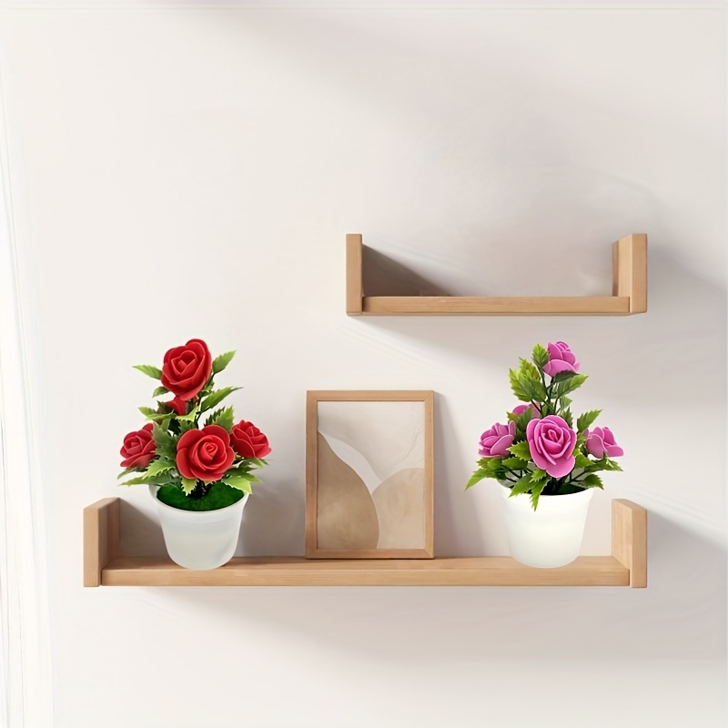 Twee levensechte kunstmatige rozen in pot