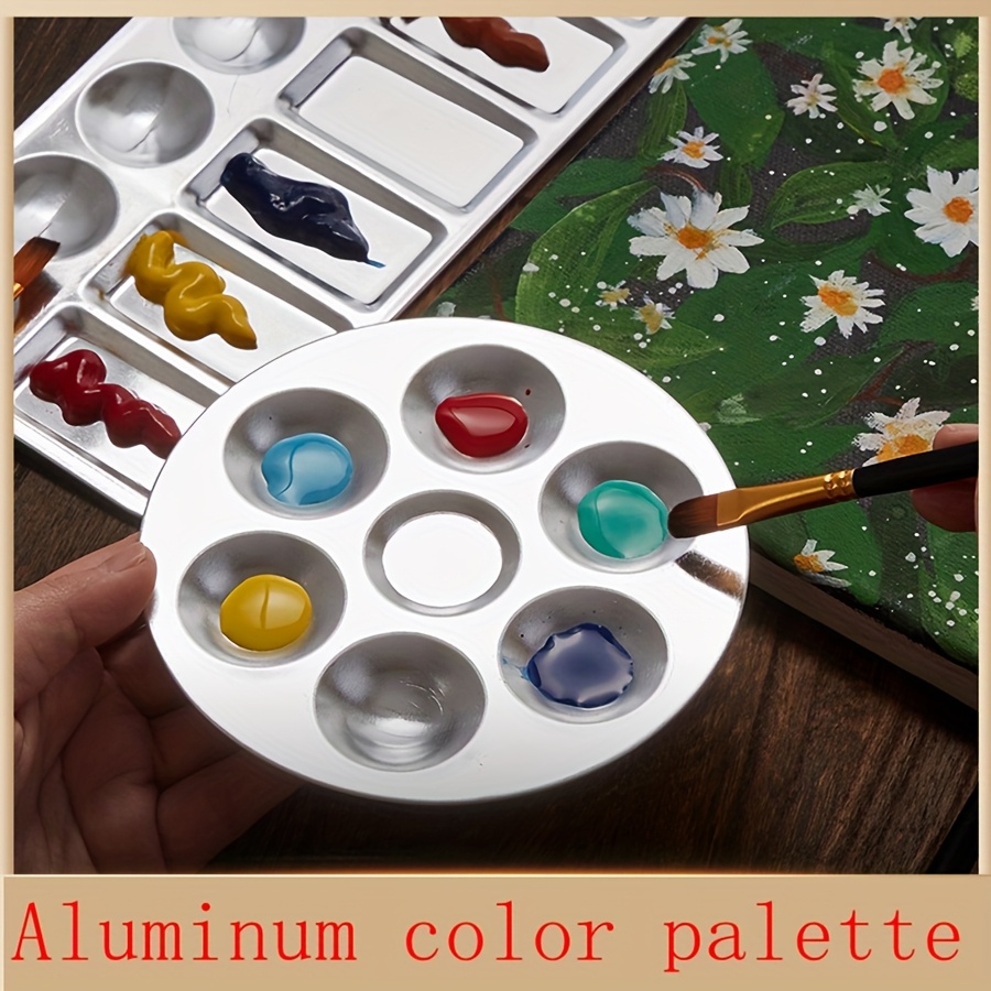 

Une palette d'aquarelle en aluminium à , adaptée à la peinture et aux fournitures artistiques.