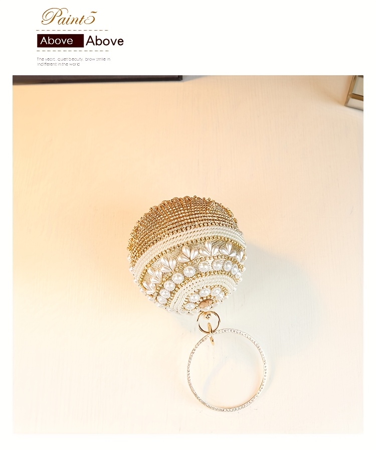 Clutch with chain strap on shoulder