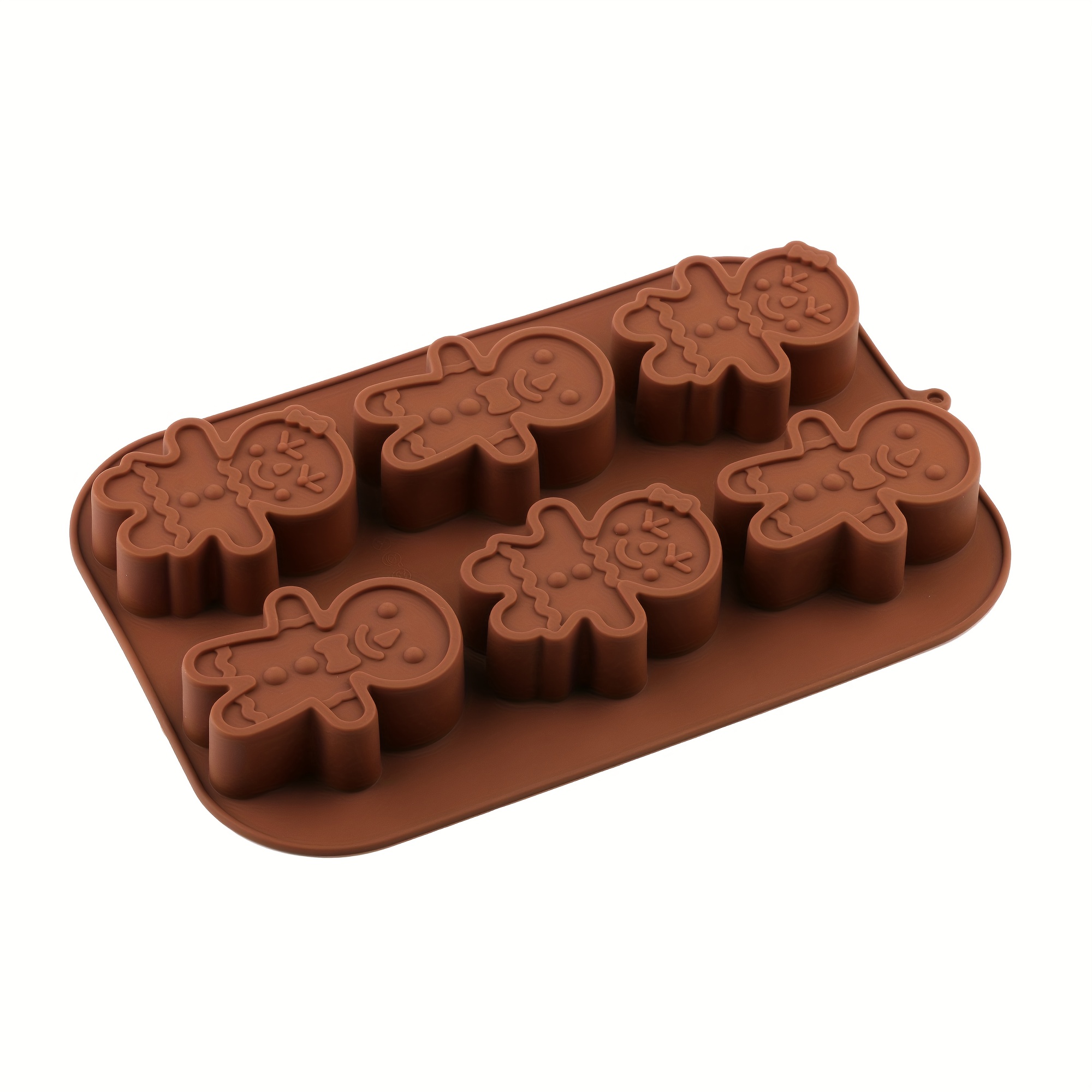 A Silicone Christmas Mold For One, Featuring A Thick Brown Gingerbread Shape, Candy Mold, Perfect For Making Christmas Gingerbread, Desserts, Cakes, And Baking