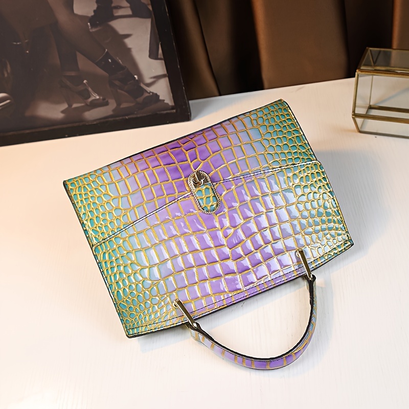 Crocodile Handbag on model shoulder carry