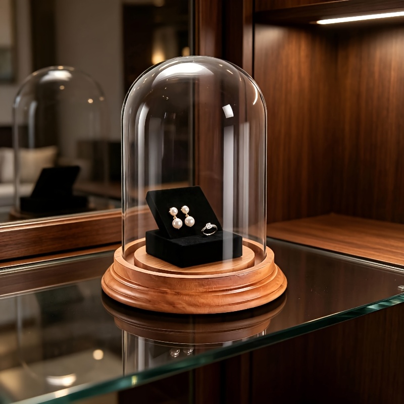 glass dome with wooden base sold on Temu United States