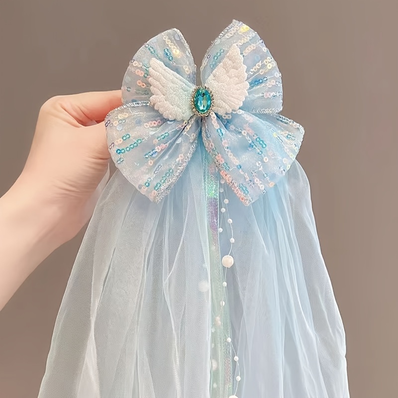 

Princess-inspired Fabric Hair Clip With Sequins, Tulle, And Wing Detail - Cute Bow Hair Accessory With Tassel And Bead Accents For Girls