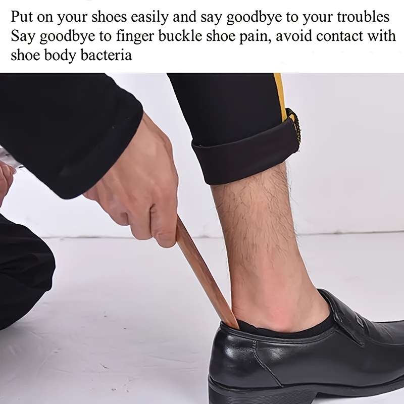 A Long-handled Shoehorn Made Of Walnut Wood, Suitable For Home And Hotel Use