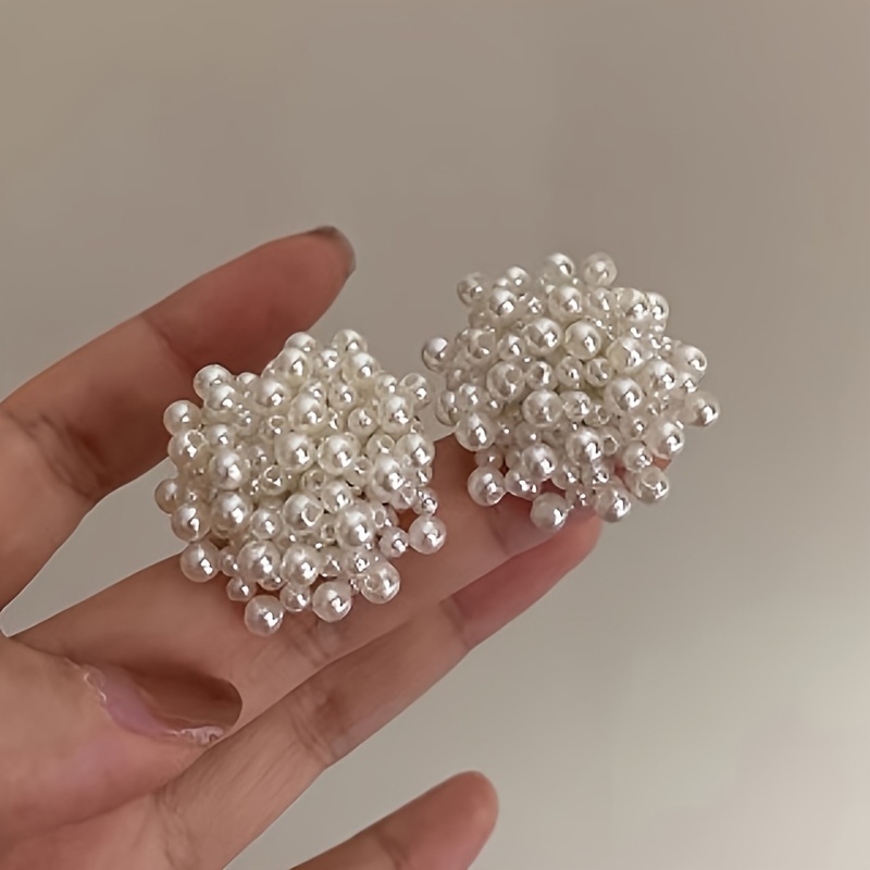 Exaggerated White Flower Earrings With A , Featuring Pearl Fireworks And Unique Beaded Design, Embodying A Chic French Style.