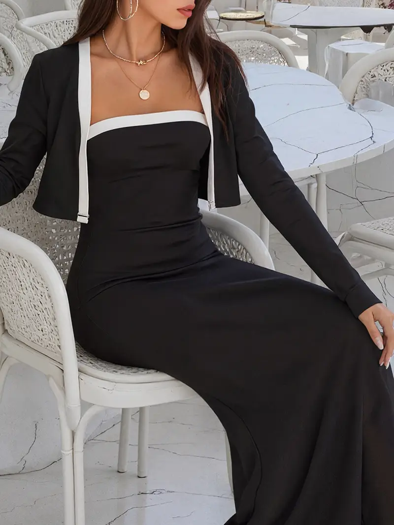 black midi dress with cardigan Black midi dress with a side slit $108, Ivory cardigan with flower details $108, Sunglasses $48