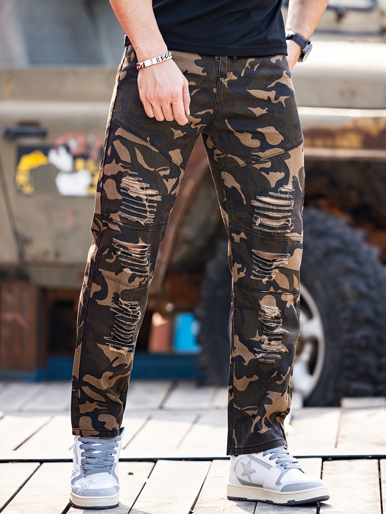 Ripped cheap camo sweatpants