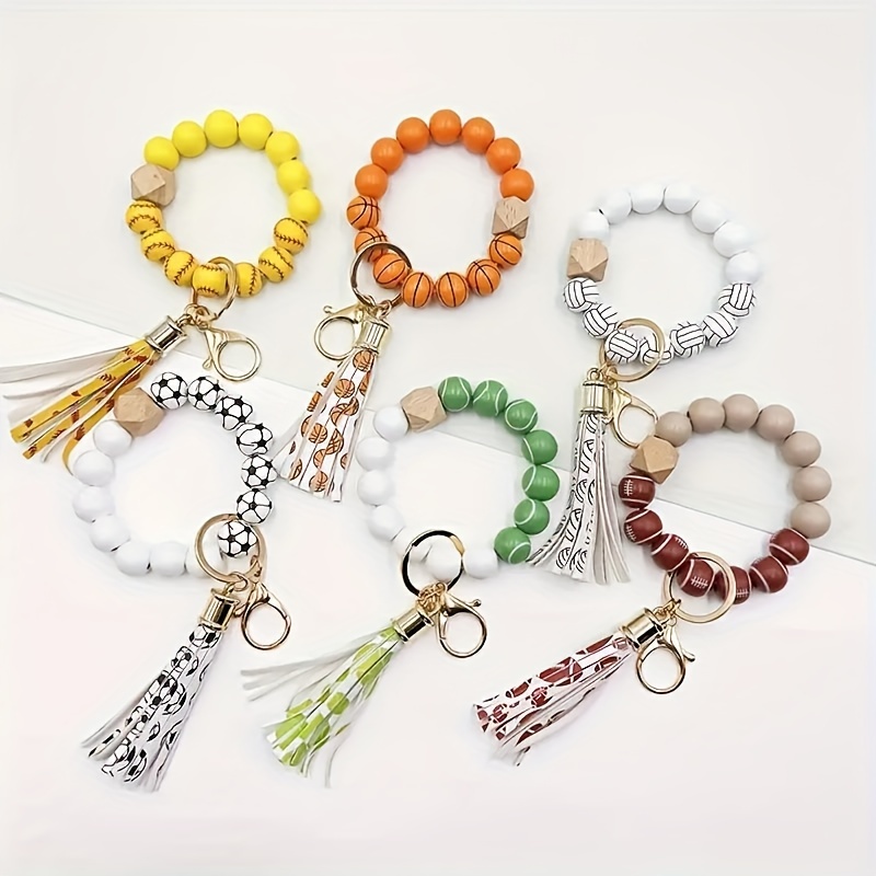 

1pcs Wooden Sports Ball Beads Wristlet Keychain With Tassel, Cute Purse Charm & Phone Lanyard For Women, Assorted Styles