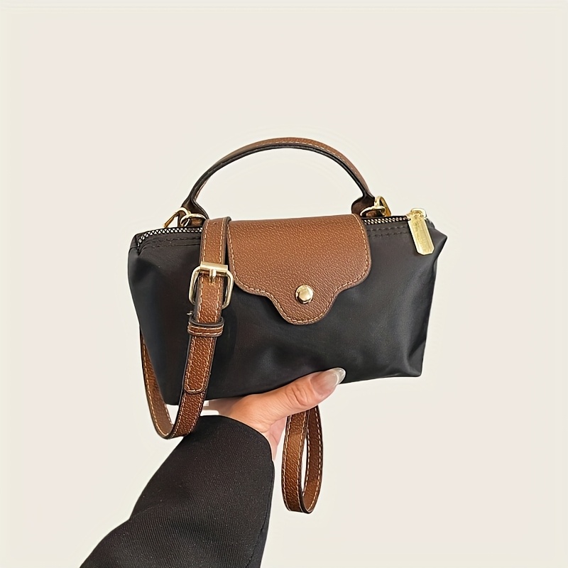 una borsa elegante da donna, caratterizzata da un elegante e   design con cerniera in nylon, adatta per trasportare il telefono. può   utilizzata come borsa a   o a tracolla, perfetta per uscite  ,   casual o come regalo per   come il natale.