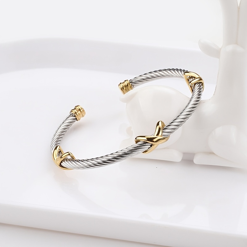 Fashion Easy Metallic Style Twisted Open Bangle Suitable For Holiday Gifting And Party Wear