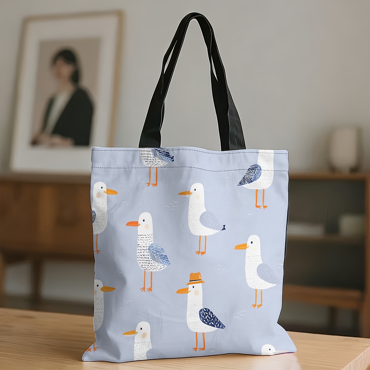 TEMU 1pc Double-sided Printed Tote Bag - Made Of Sturdy And Durable, This Printed Tote Features With A Fun Cartoon Seagull Pattern. Some Are Wearing