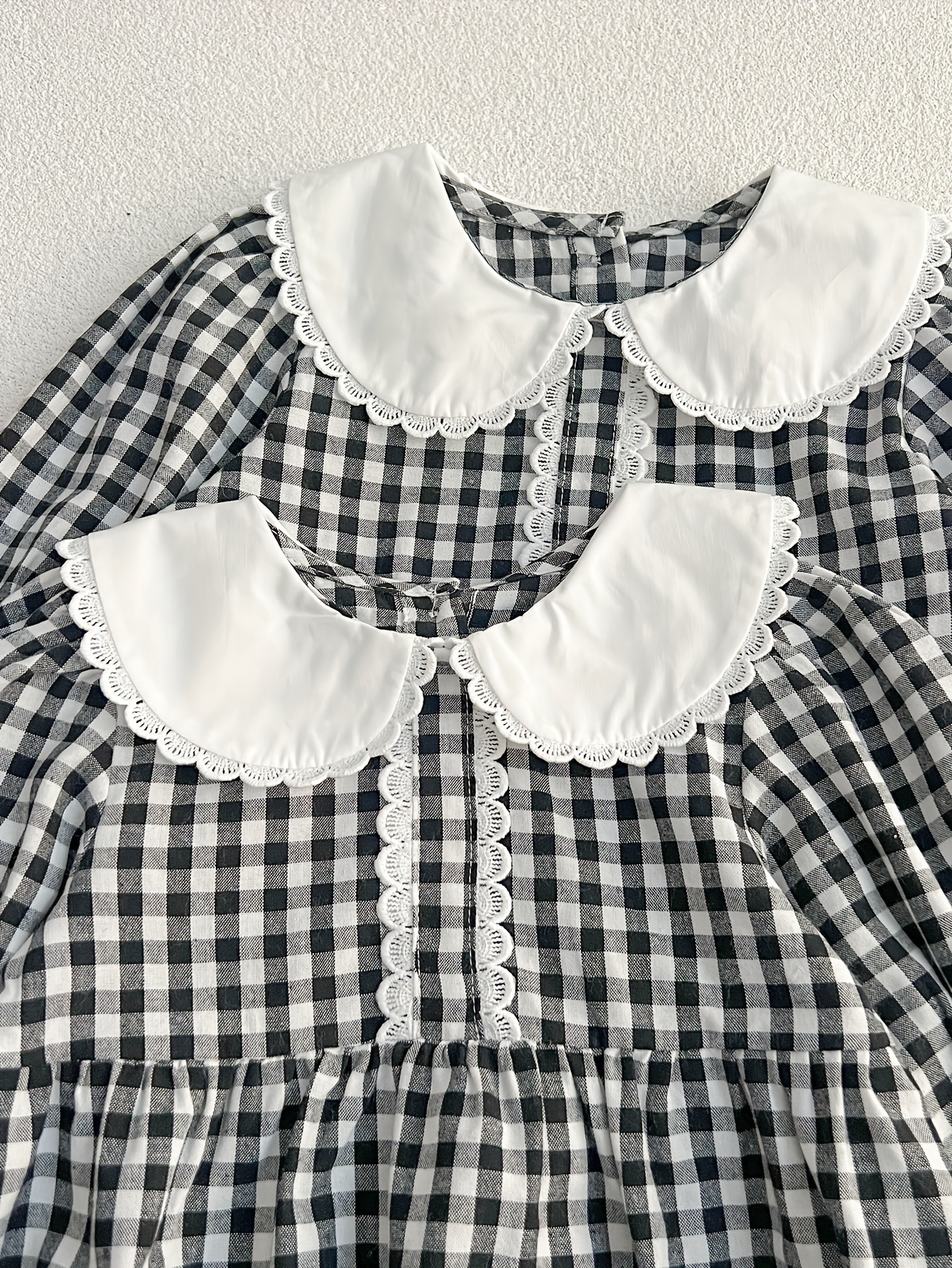 black & white check dress The Flounce Smocked Midi Dress