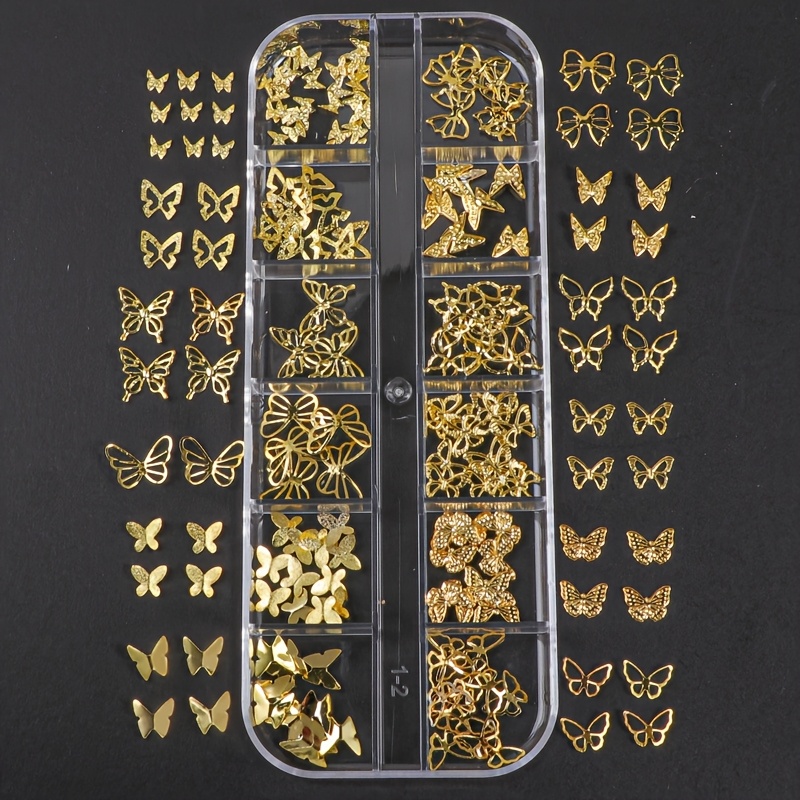 Of 12-grid Mixed Nail Art Studs In Golden , Including And Bow Designs - Versatile And Delicate Nail Decorations For Everyday Use