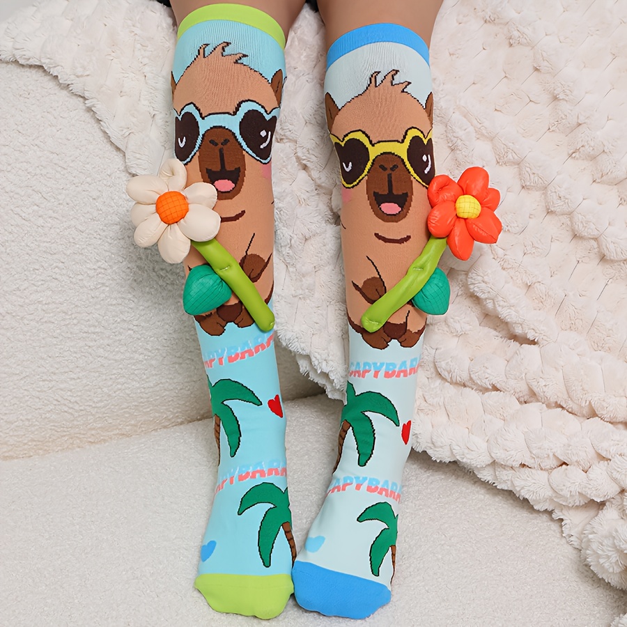 Image of A Pair Of Kid's Over-the-knee Socks Featuring Three-dimensional Flower And Capybara Designs, Suitable For Kid' Wear, Party Outfits, And Ideal For Holiday Gifting.