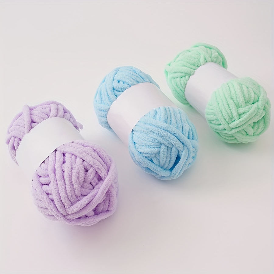 

Chunky Yarn Balls In Blue, Green, And Purple - Knitting And Crocheting Projects