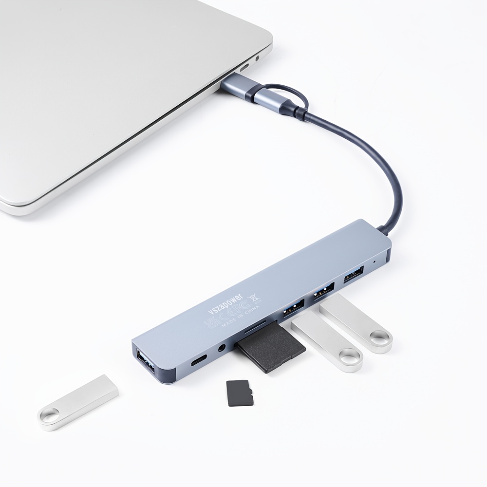 an 8 in 1 multifunctional docking station with a usb c a supporting high speed usb 3 0 transfer it a tf sd card reader and a 3 5mm headphone jack making it lightweight and portable suitable for devices like laptops and smartphones expanding options and enhancing work details 1