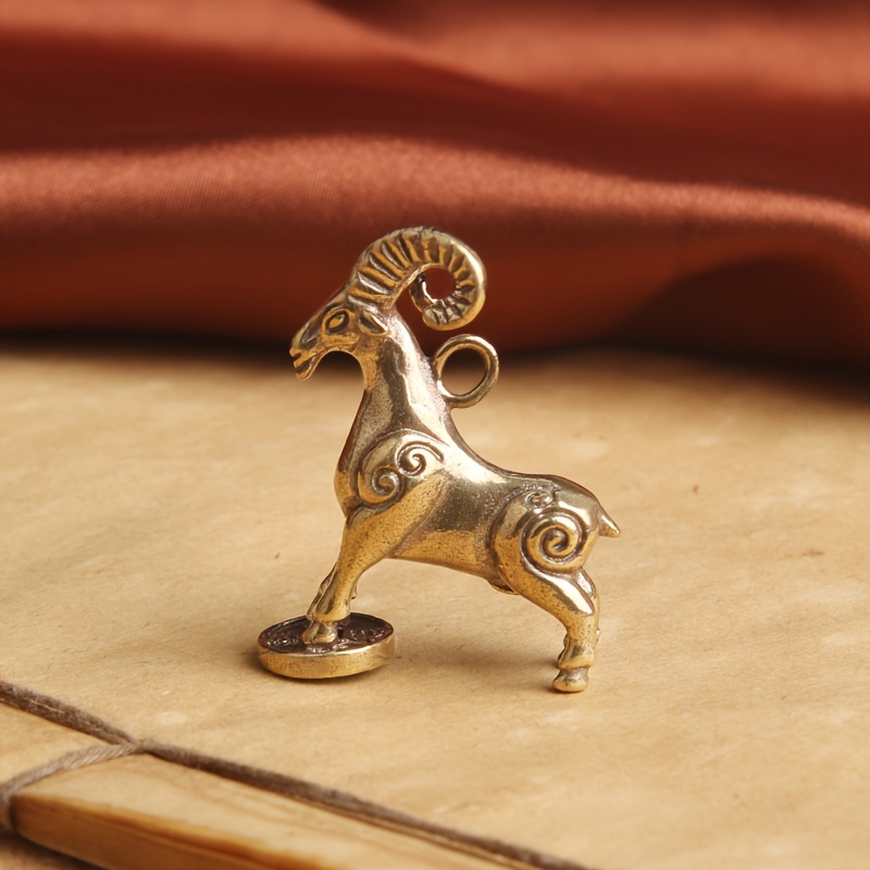 

Antique Brass Goat Charm: A Festive And Decorative Home Accent