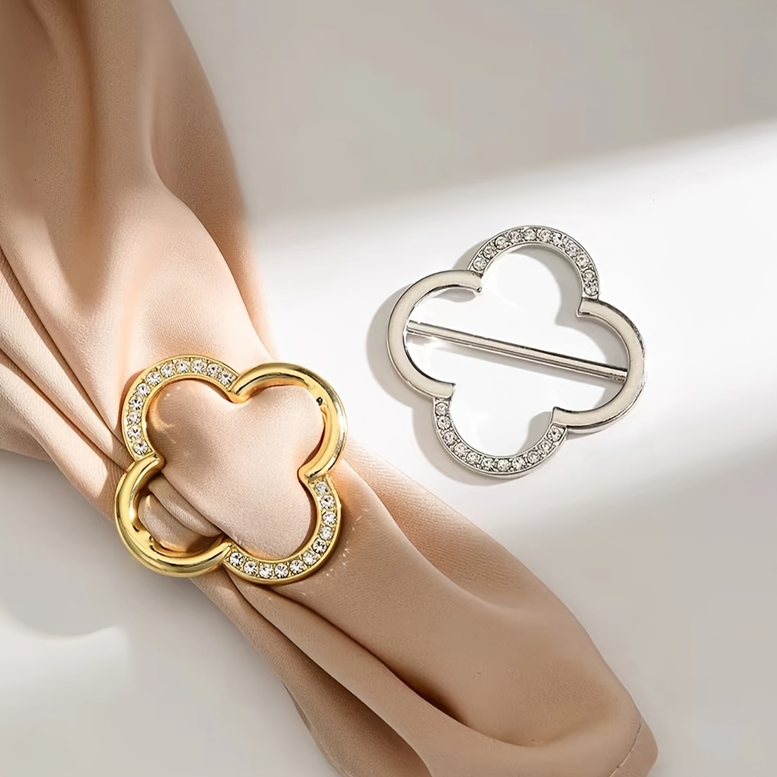 Image of 2 Scarves Tied In A Knot At The Corners, With A Clover-shaped Decorative Button To Fix The Hem Of The Versatile Clothing, A T-shirt Button Accessory For Women.