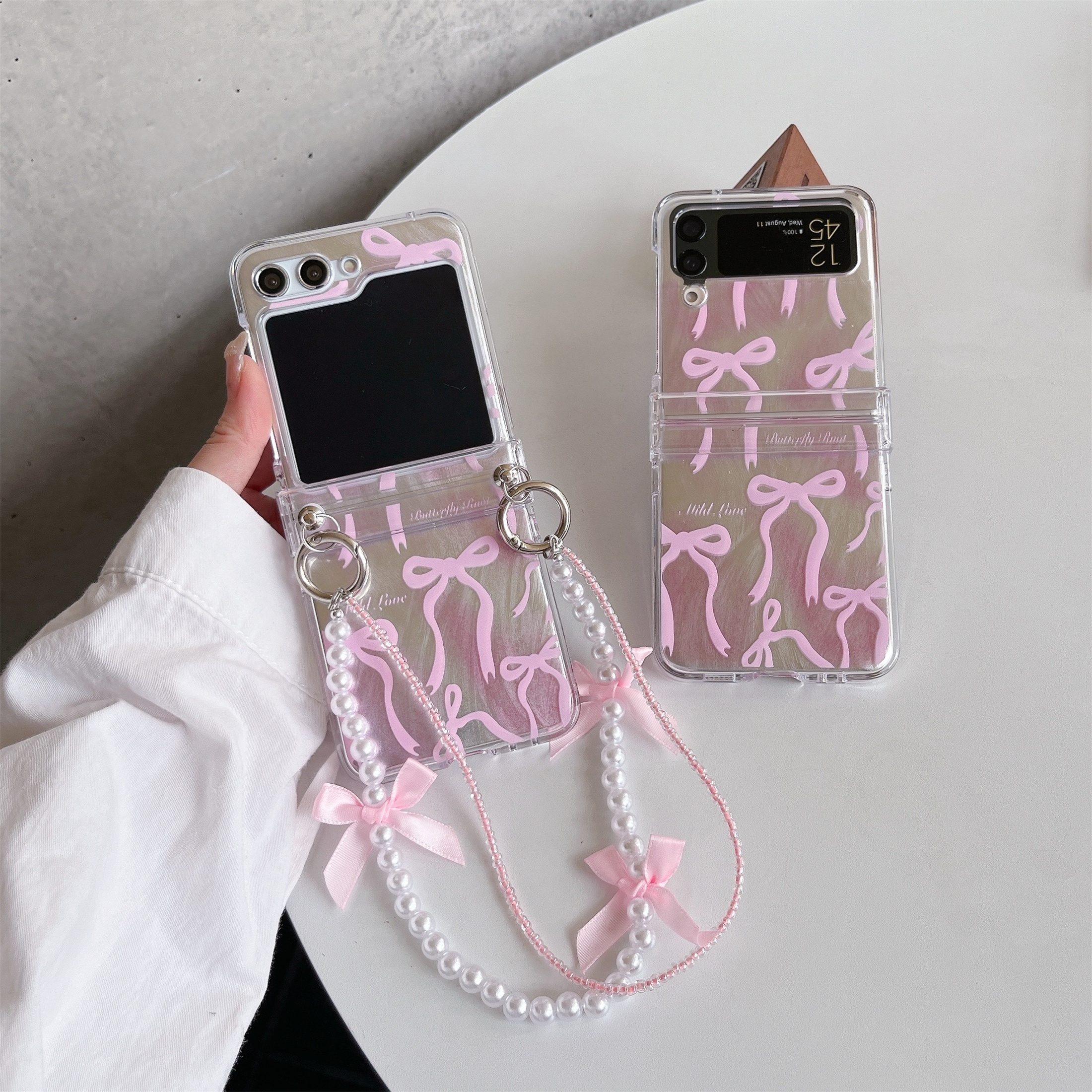 

Feather Pink Bow Bracelet Folding Mobile Phone Case, Suitable For Samsung Zflip3/4/5/6 Lanyard Full-cover Protective Cover