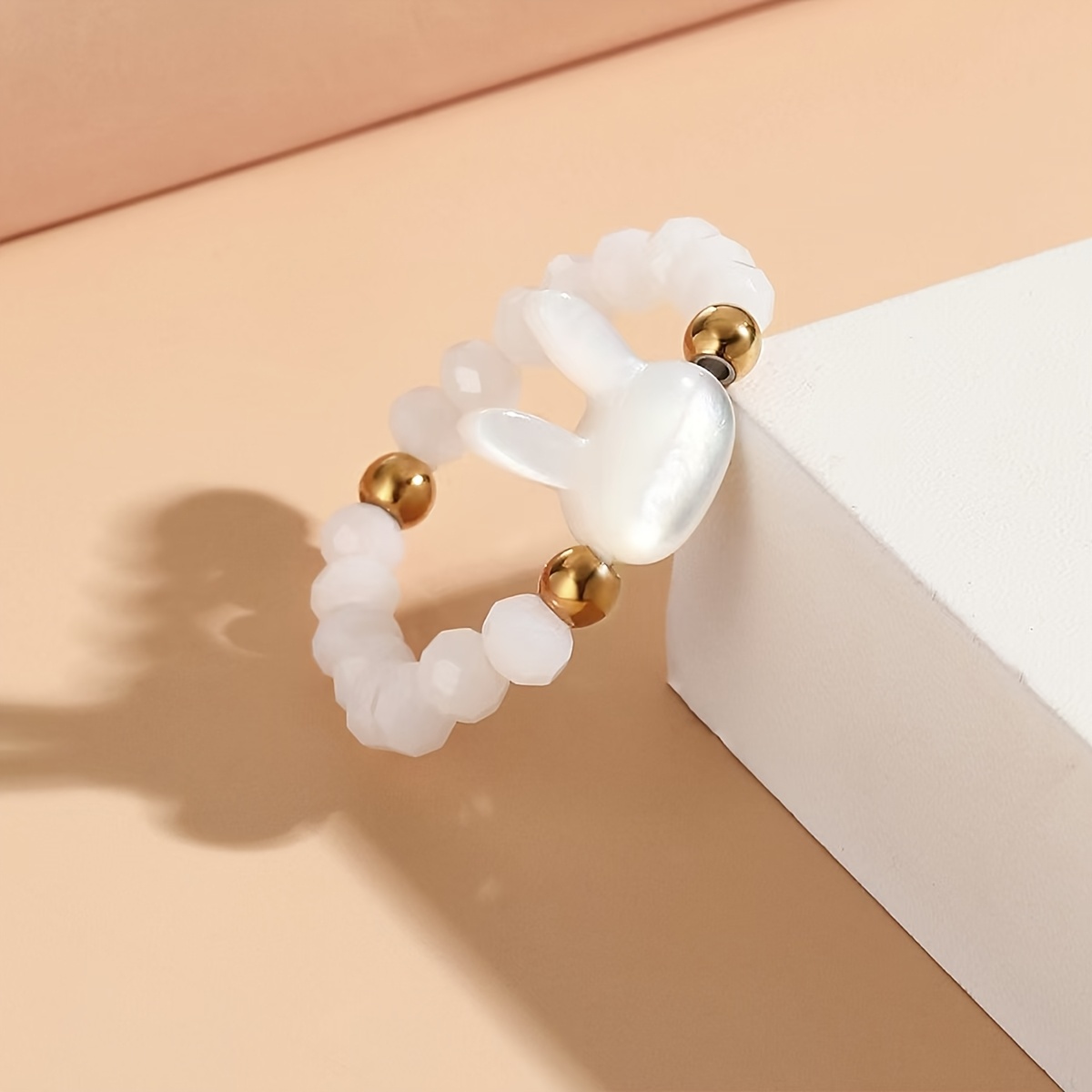 Beaded Stretch Ring with Rabbit Charm Golden Accents