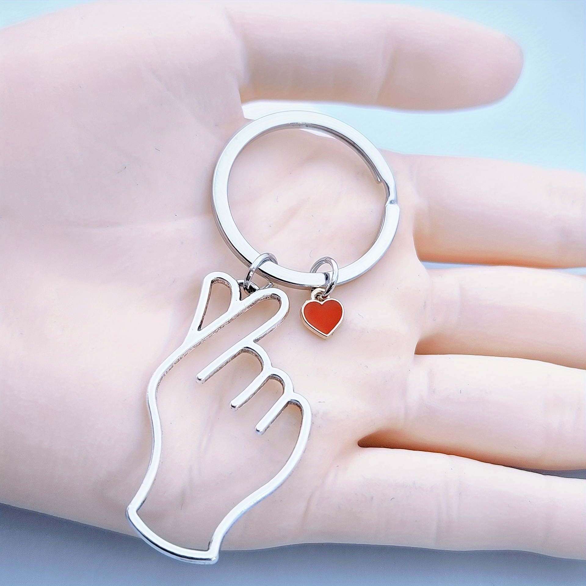 Image of 1pc 1pcs Cute Hollow-out Heart Gesture Keychain Suitable For &, Hollow Than Heart Gift For , , Family - Hollow-out Gesture, Hollow-out Shape For Keys, Bags, Backpacks, Daily Use Accessory
