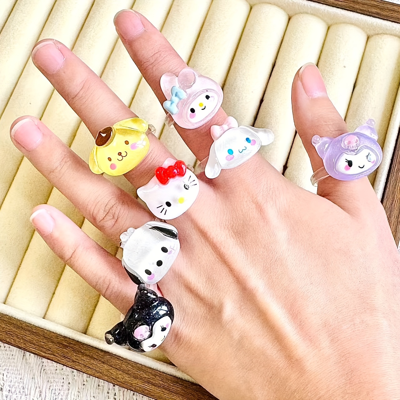 E-shop 7-teiliges Cartoon Pudding Hund My Melody Ring Niedlicher Kuromi Kitty Katze Offener Ring Hello Kitty Katzenring Tragbarer Harz Niedlicher Hund