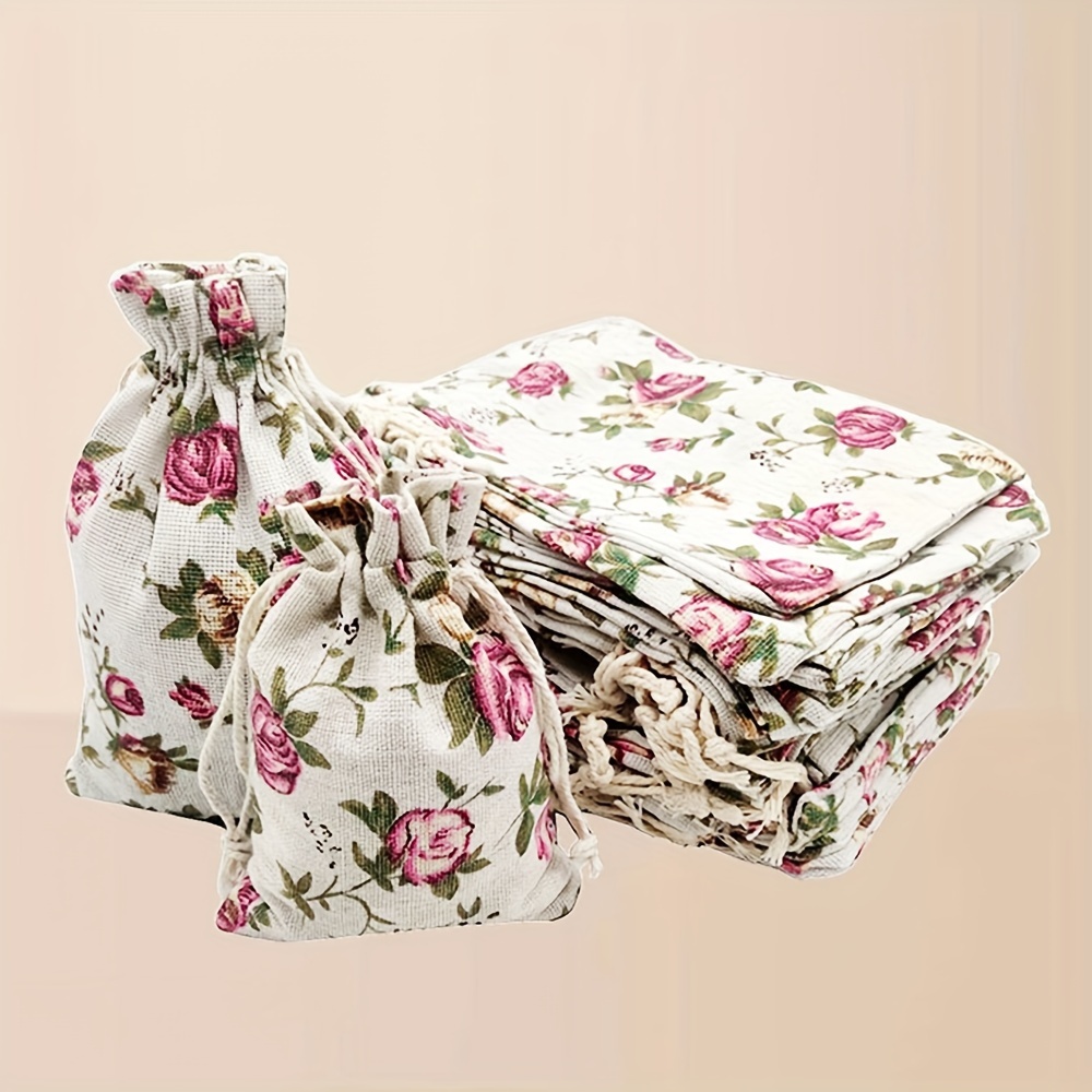 

Lot de 10 Sacs Cadeaux à Imprimé Rose avec Cordon - Parfaits pour , Anniversaires & Plus - Emballage Élégant pour Bijoux, Sacs en Lin de 3.94" x 5.51