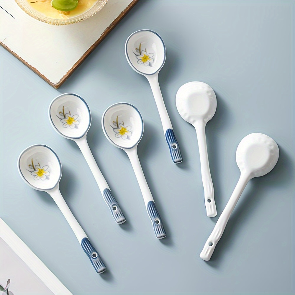 

Set of 4 to 6 pieces of ceramic spoons for desserts, soups, milk, ramen noodles, salad mixing, and coffee, with long handles and lovely flower patterns, suitable for family restaurant use.