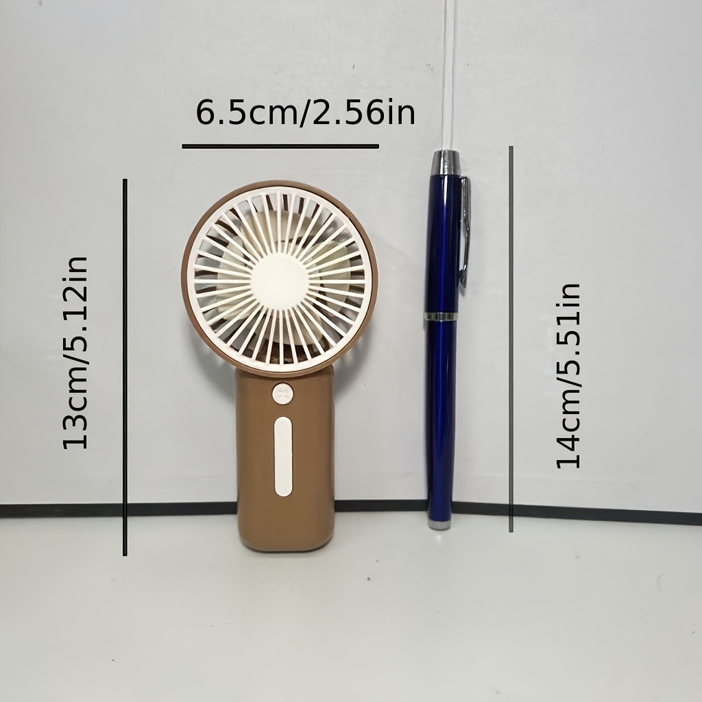 Mini Ventilador Portátil de Mano Disponible en 4 Colores - Portátil y Compacto (Sin Costo) - Adecuado para Múltiples Escenarios