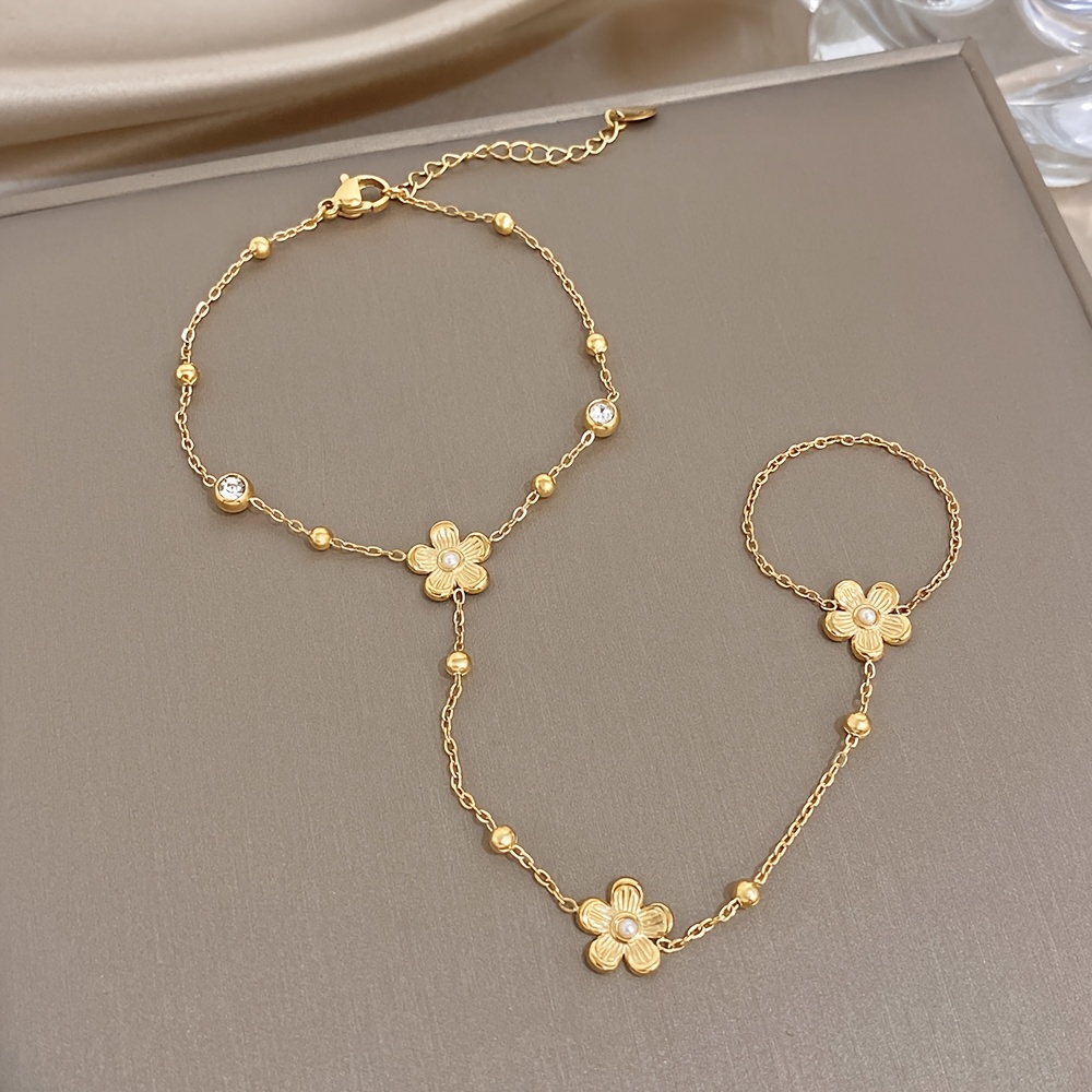 Women's Plum Blossom Finger Chain Bracelet with Synthetic Zirconia