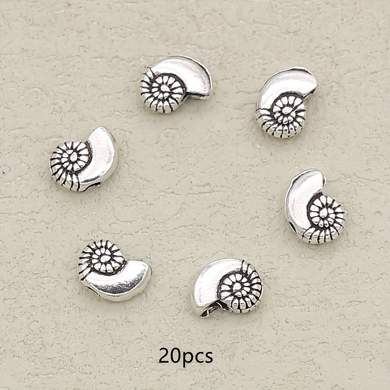 E-shop 20 Stück Vintage Silberne Mini-Muschel-Anhänger Perlen mit kleinem Loch, Lose Perlen, Abstandsperlen, Dekorationsperlen für DIY Basteln,