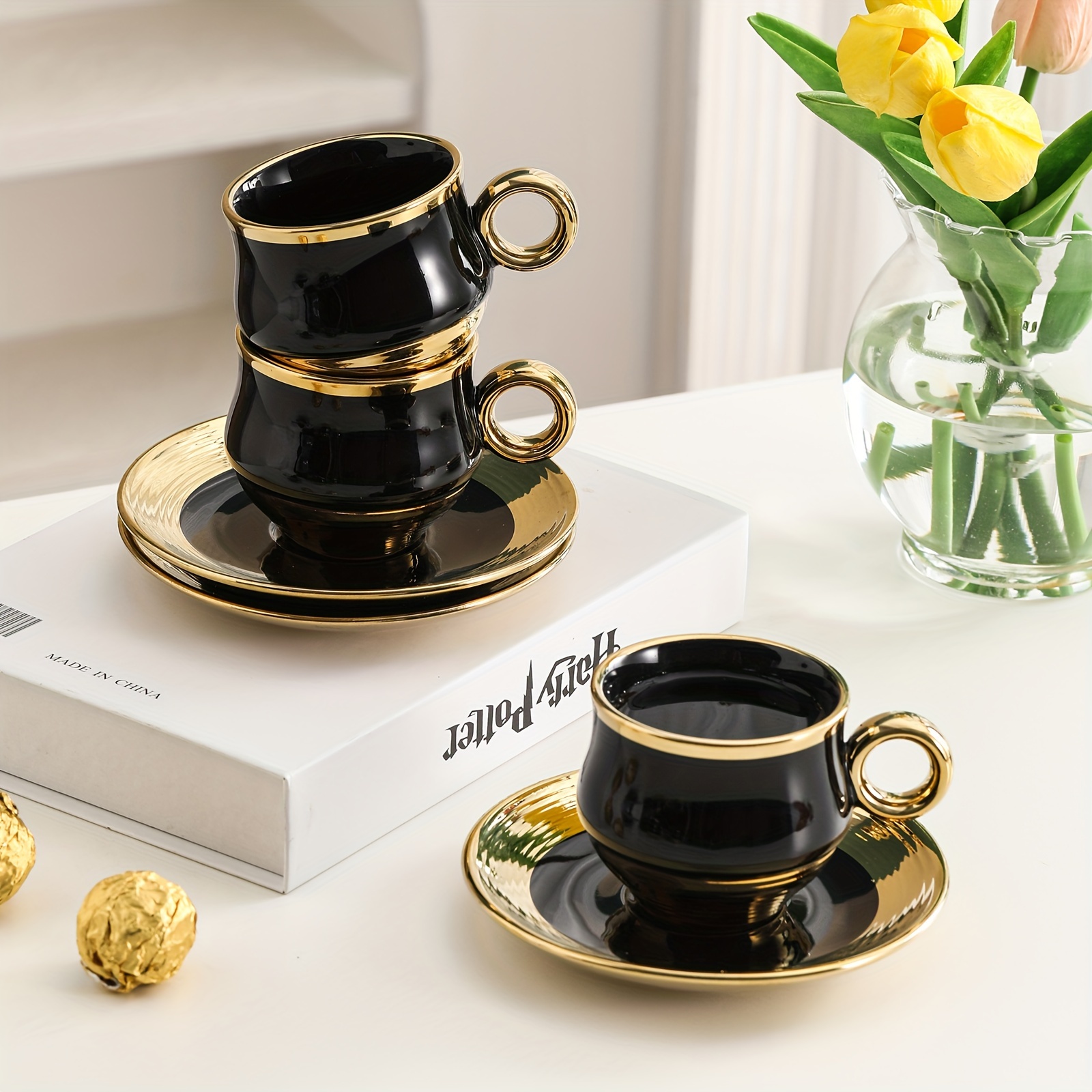 elegant gold trimmed black ceramic coffee cup and saucer set hand wash only bpa free microwave safe insulated easter theme reusable graphic pattern oval shaped multipurpose use for cold beverages ideal for adults luxury business gift 6 cups 6 saucers 150ml 5 29oz details 3