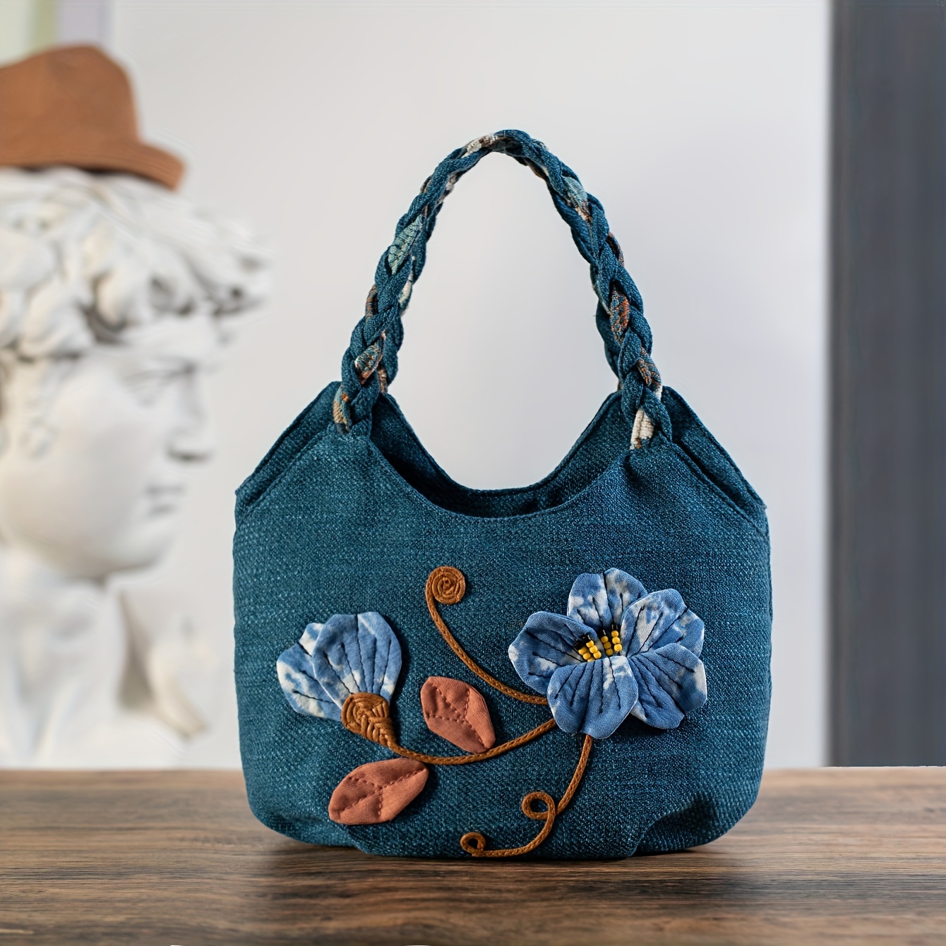 

1 Bohemian Handcrafted Blue Denim Tote Bag With Floral Embroidery, Braided Handle, And Multiple Compartments - Polyester Lined, Zip Closure For Casual