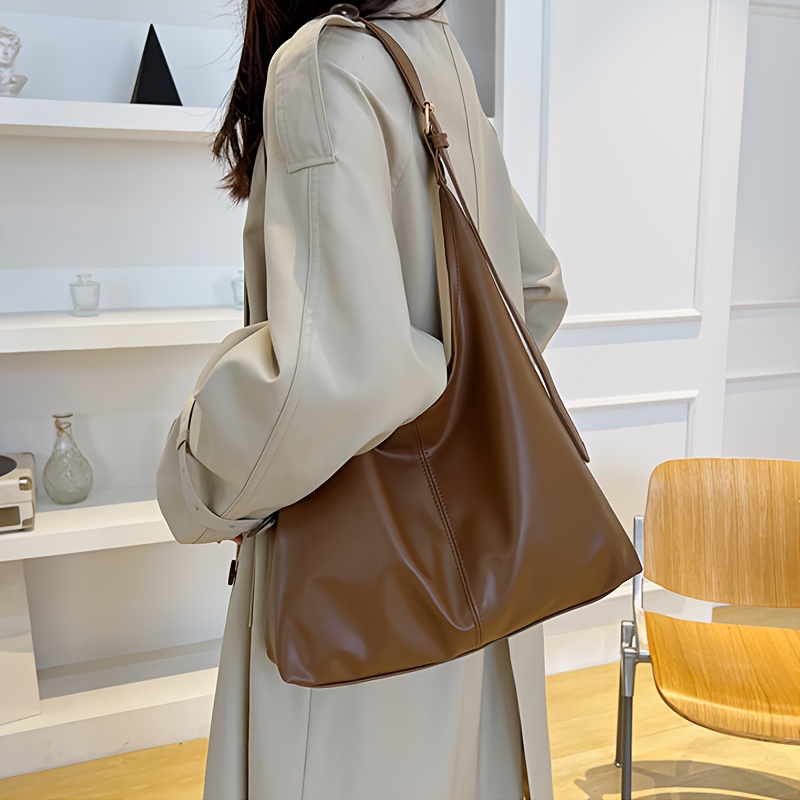 

Of ! This Large Capacity Shoulder Tote Bag, Made With High-quality Material, Is But Accommodates Your Commuting , Helping You Busy Workdays With Ease!