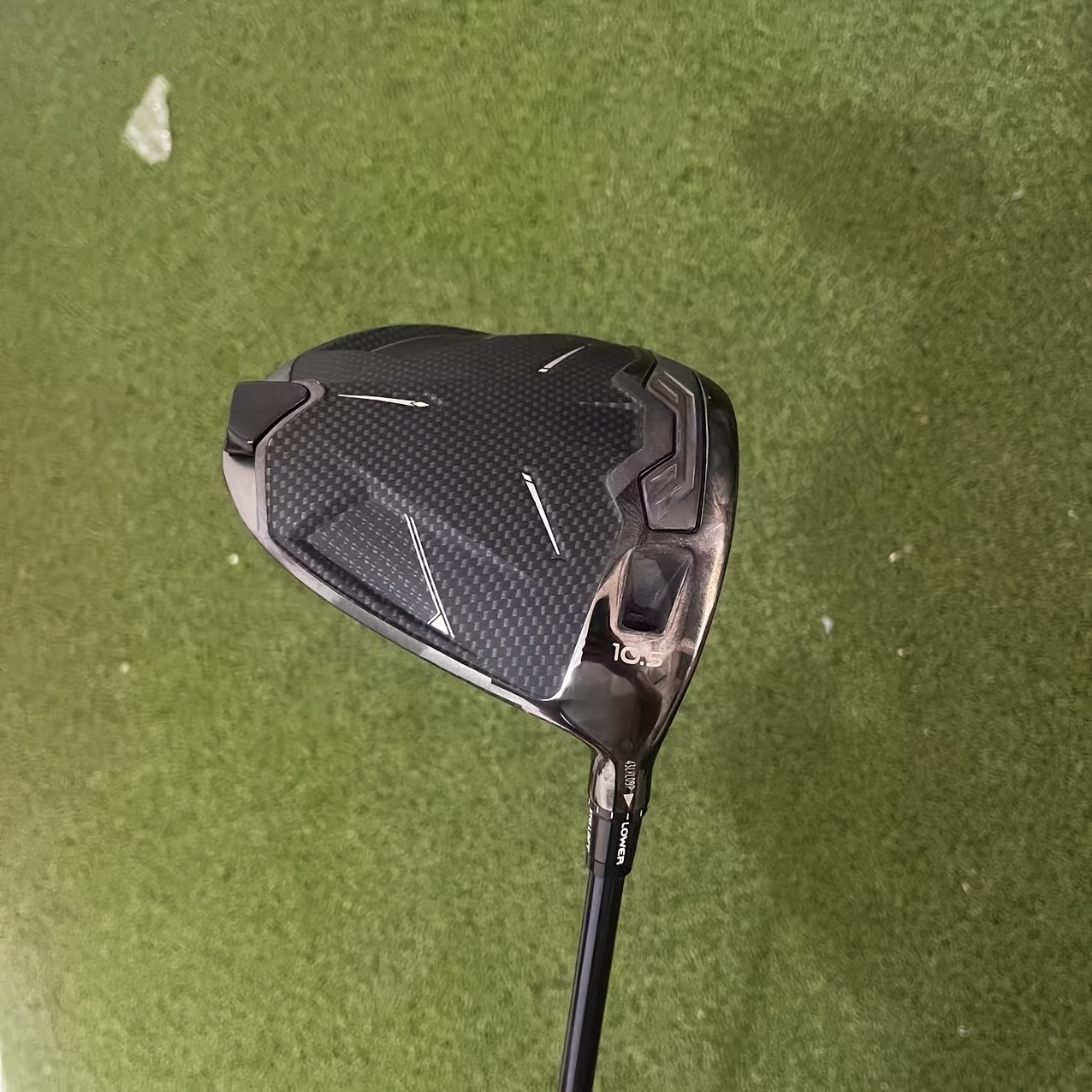 a titanium alloy golf driver with   containment and   multiple loft     from and micro adjustable loft suitable for professional and amateur players