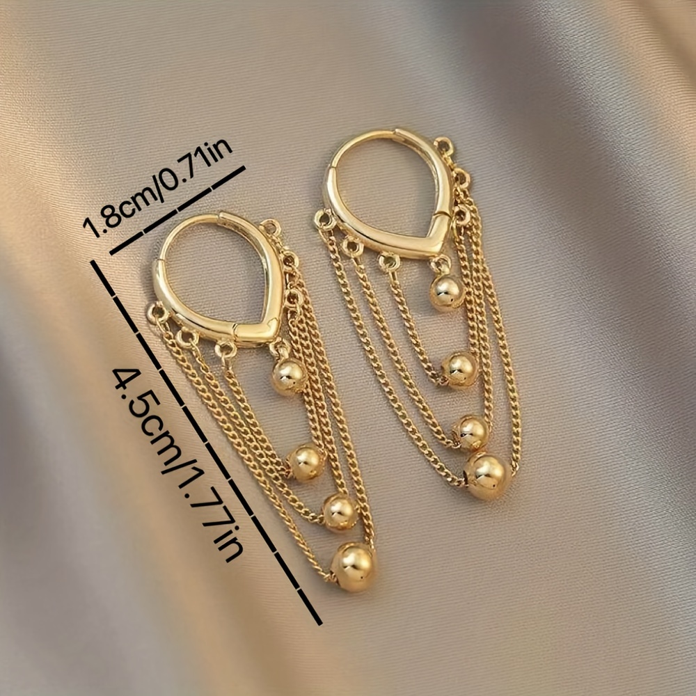 Stylish Tassel Earrings with Golden Sphere Pendant