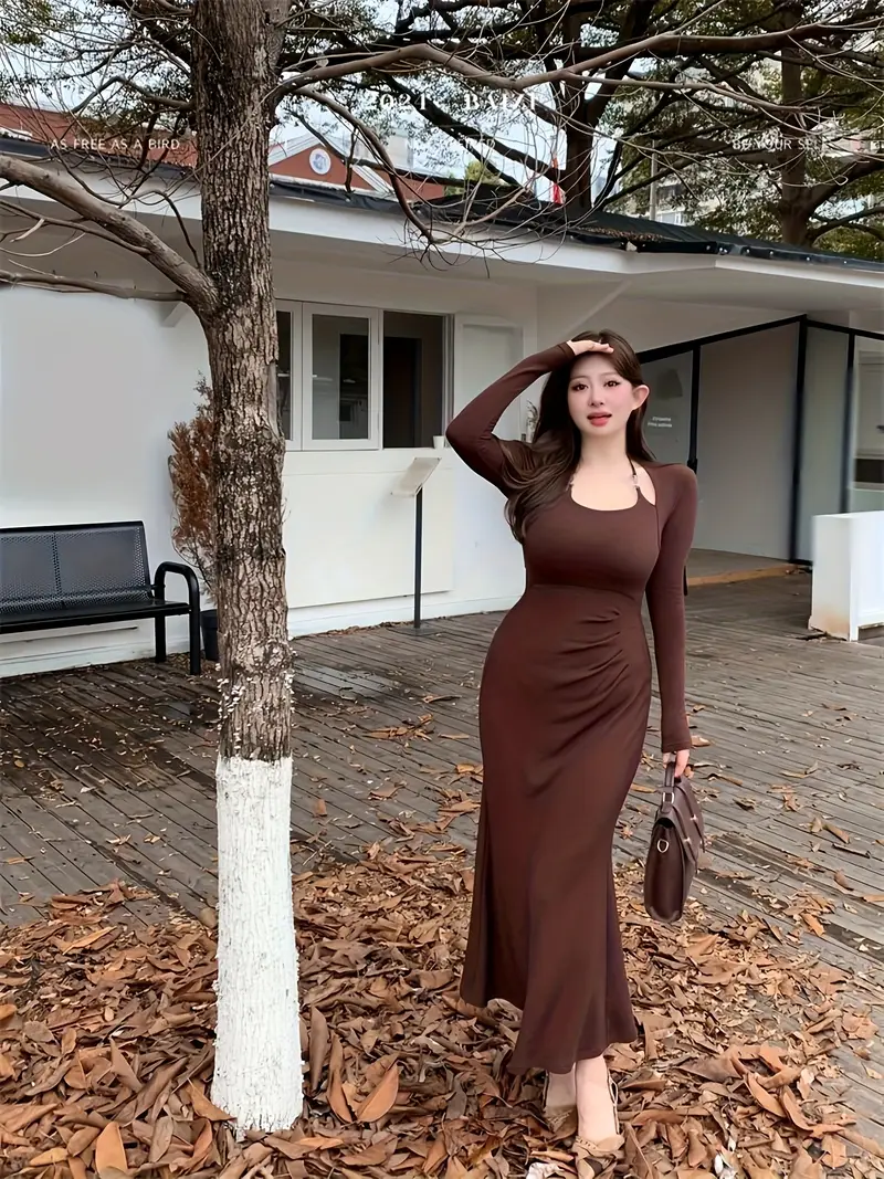 celebrity halter neck dress Two looks, one unforgettable night at the Hollywood Bowl where elegance met orchestral magic alongside the @laphil From soft pink shimmer to bold black couture, she didn't just attend the