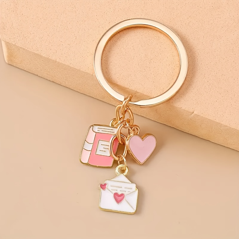 Single And Book Pendant Keychain | Alloy And Iron Material, Ideal For Valentine's Day Gift, Cartoon Theme With Flower Elements