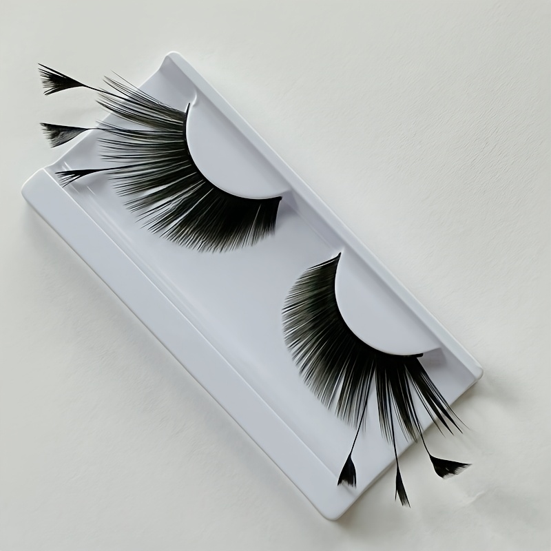 Image of Of Pink And Black Long False Eyelashes For A Festival Stage, Featuring Elegant Styling