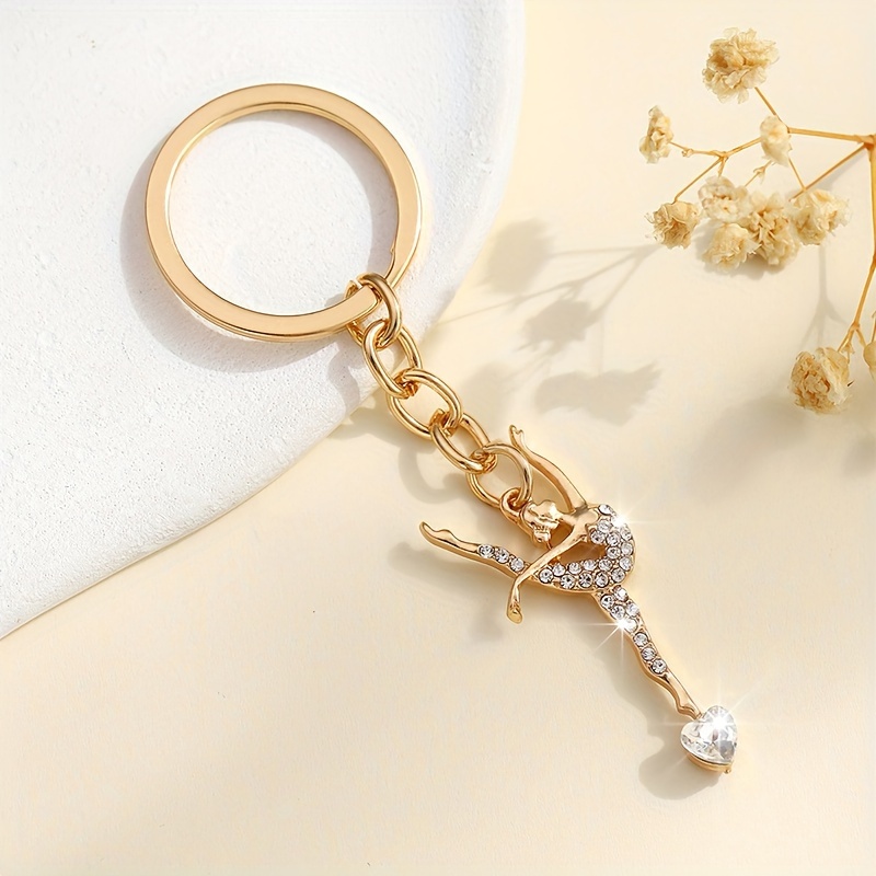 TEMU Ein stilvoller und niedlicher, tanzend geformter Strass-Schlüsselanhänger für die glamourösen Damenhandtaschen,