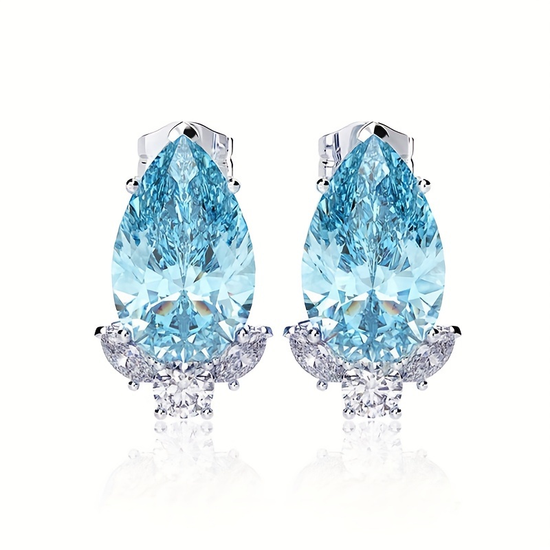 Image of A Pair Of Stylish Earrings For Women, Featuring A Luxurious And Elegant Design With Blue Synthetic Zirconia In A Pear-shaped Drop, Perfect For Wedding And Evening Additions