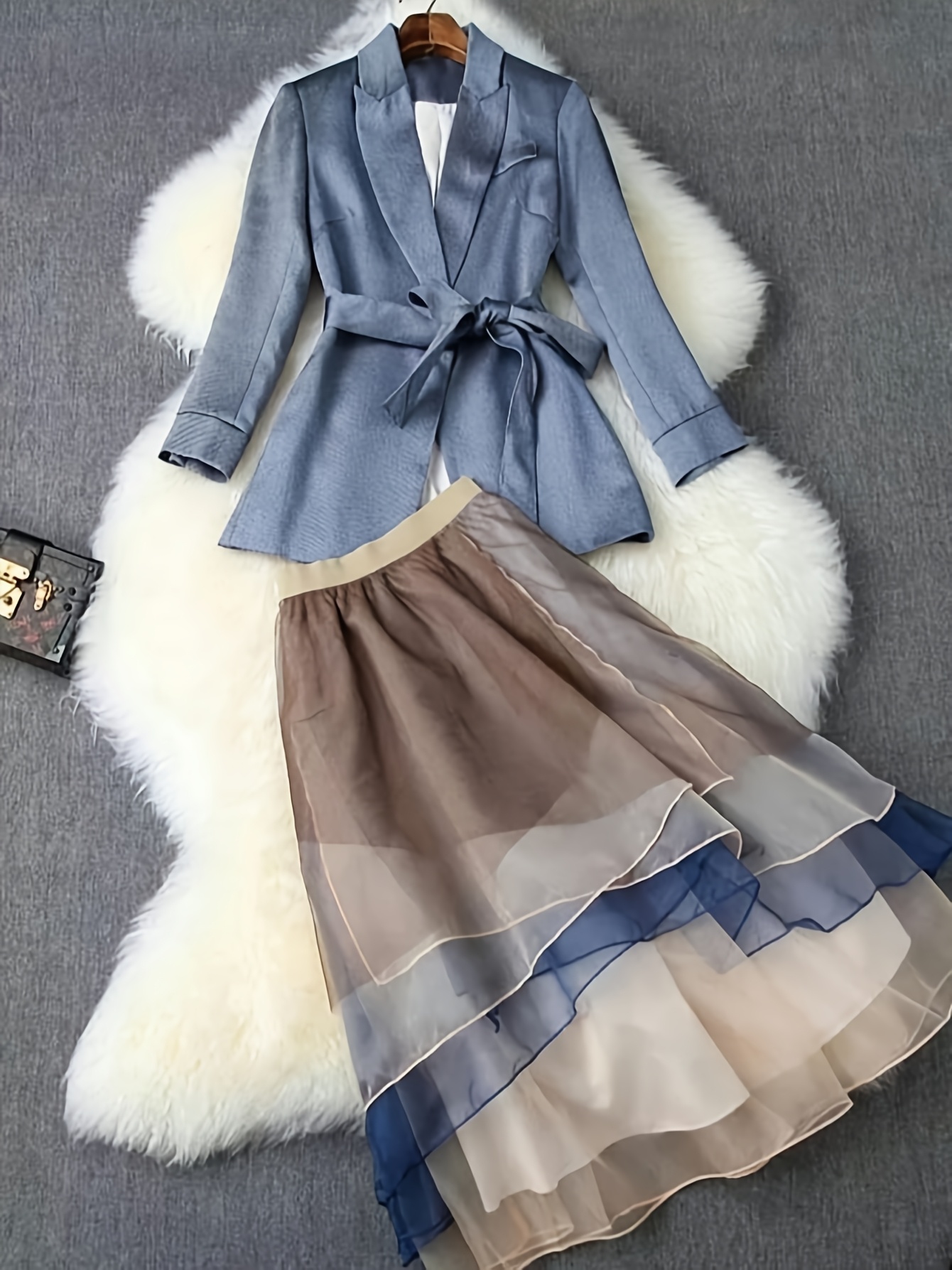 The Newness Metropolis Suit Skirt Set A chic two piece skirt suit perfect for spring and fall transitions Model showcases the sets sophisticated style