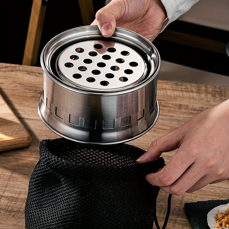 A Mini Portable Camping Stove for Outdoor Adventures: Compact, Made of Stainless Steel, And Designed for Burning Wood - Perfect for Your Next Adventure!