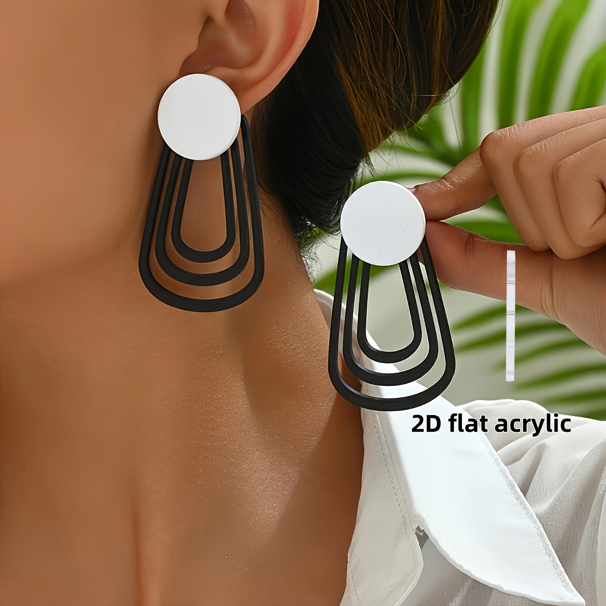 E-shop 2D Flat - Ein Paar stilvoller und einzigartiger, schwarz-weißer, geometrischer, hohler Ohrringe, geeignet für Damen als Alltags- und