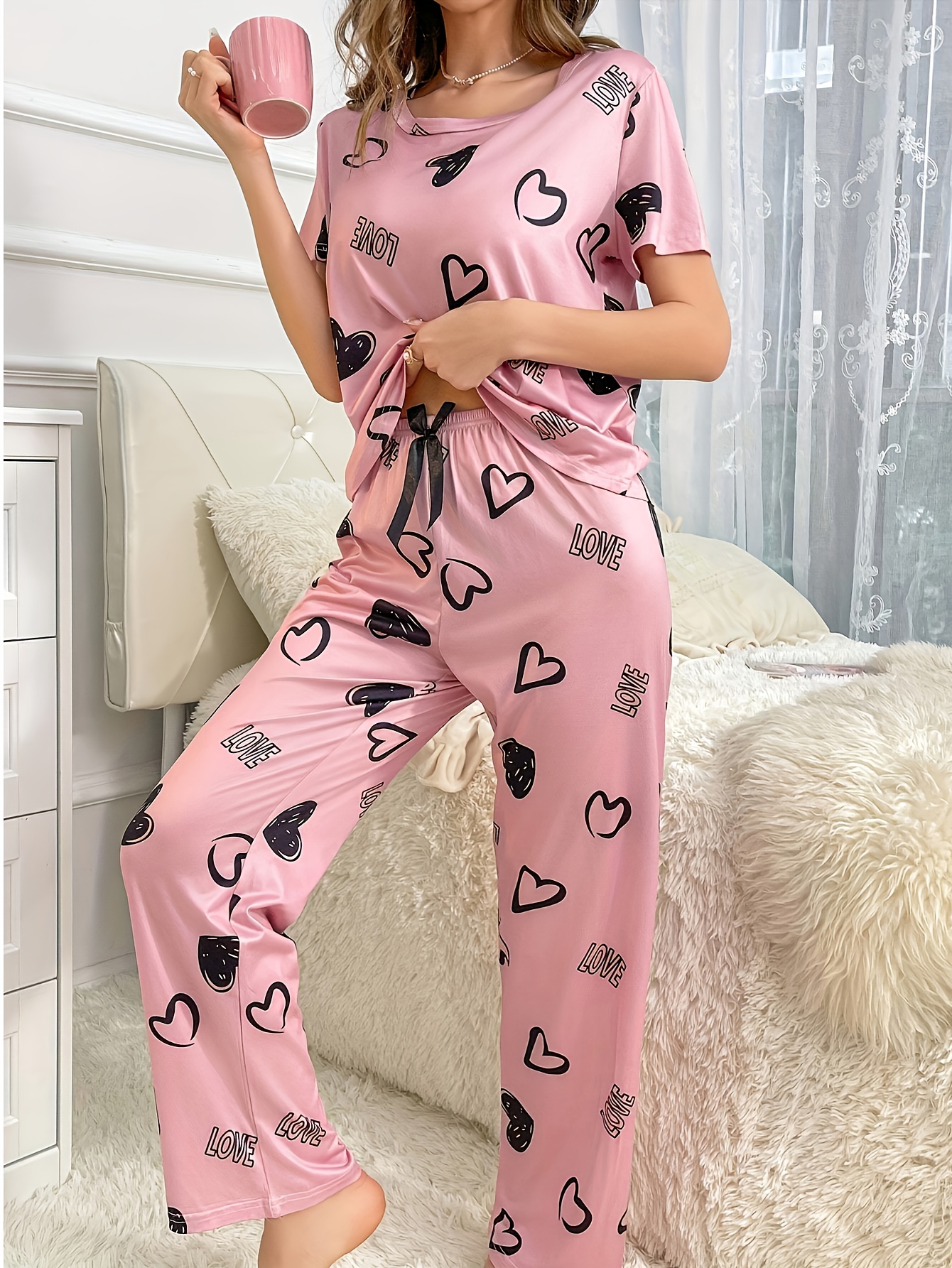 an adorable   and letter print womens pajama set featuring a short sleeve round neck top   with long pants soft and comfortable Product details 4