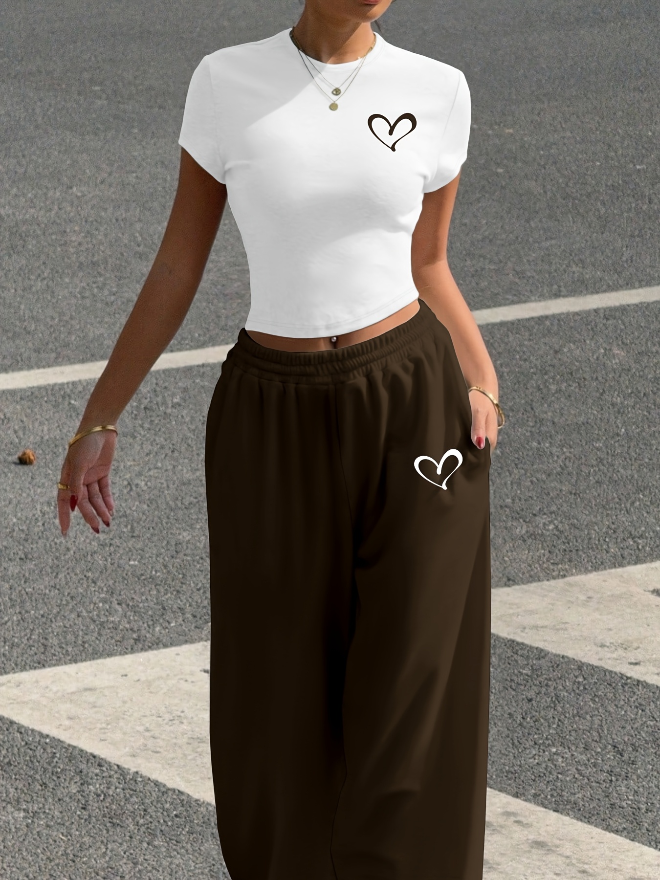 A Stylish Two-Piece Set for All Seasons, Featuring a Heart Print Casual Outfit, Consisting of a Fitted White Short T-Shirt And Tapered Jogger Pants, Machine Washable, Perfect for Street Fashion And Vibes