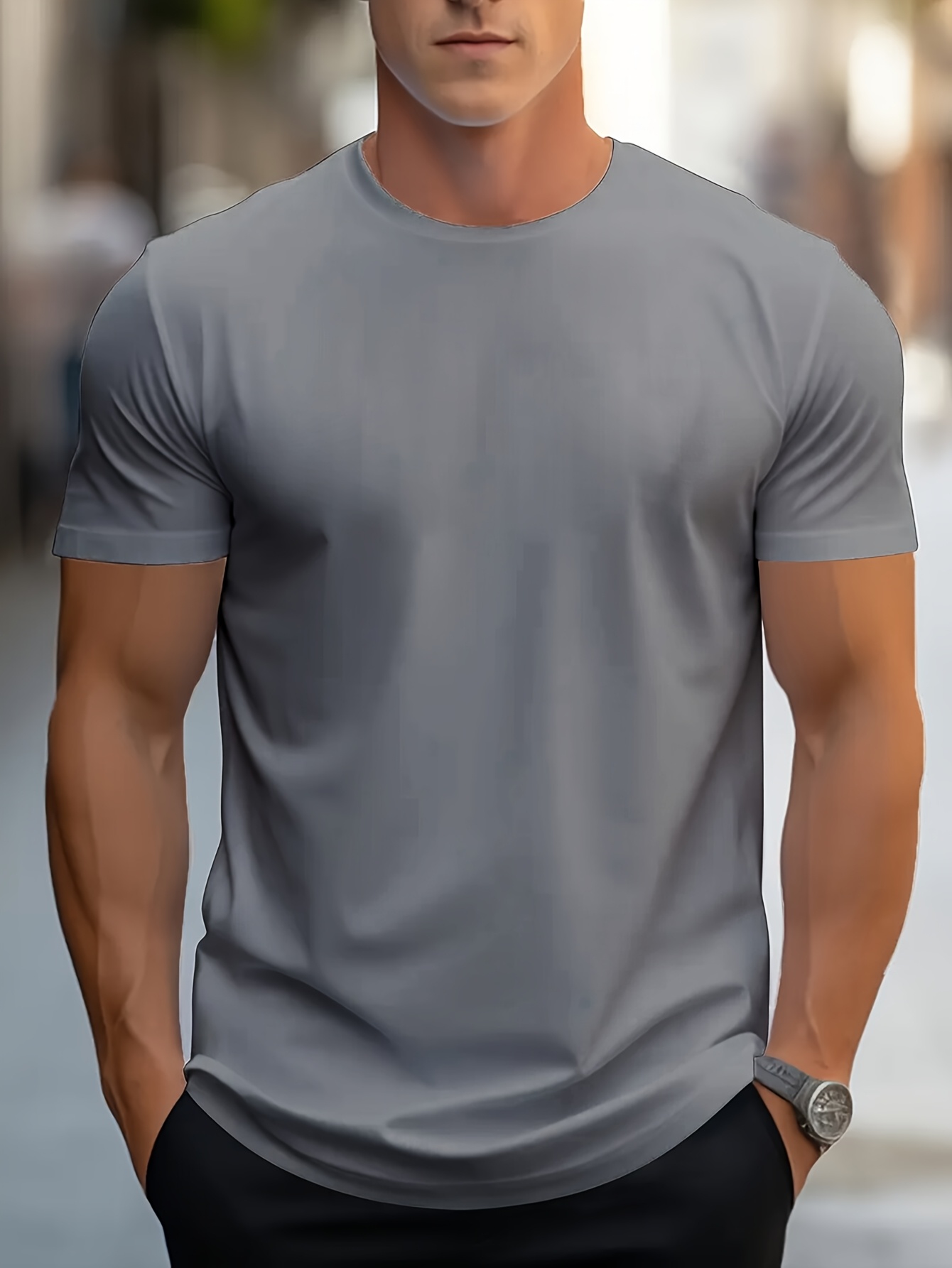 una camiseta   de color  , sencilla,   y a  . un top   para hombre,   y casual,   para entrenamientos, deportes y uso  .