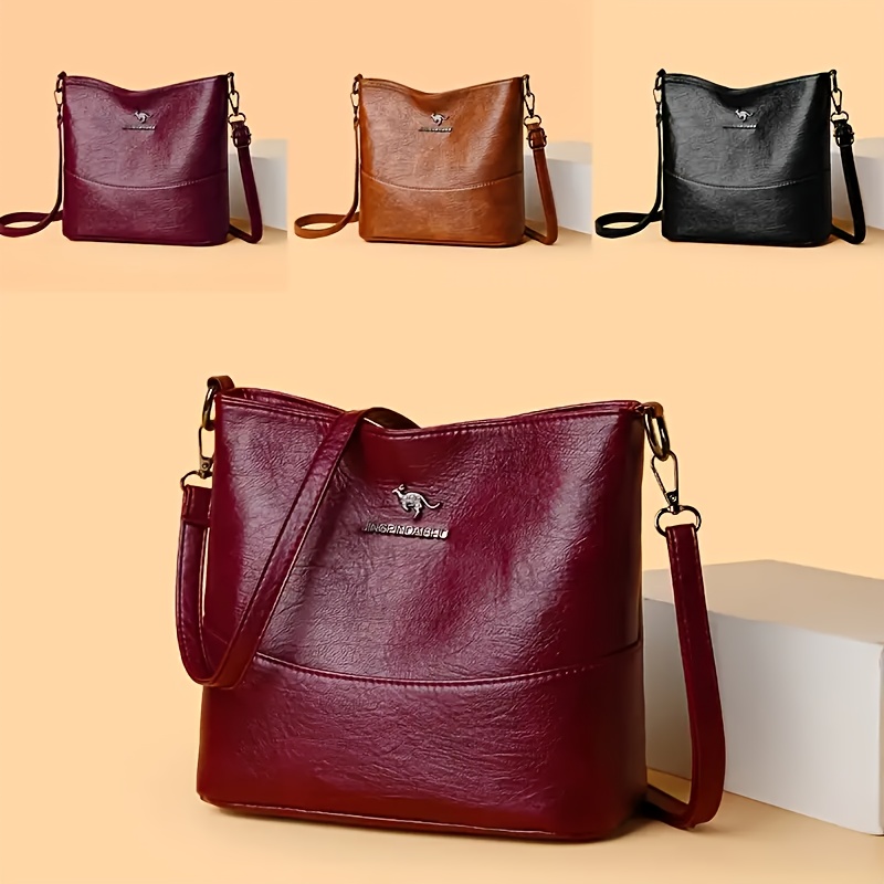 

A Minimalist Bucket Bag With A Vintage , This Stylish Shoulder Bag Is Women And Worn Crossbody.