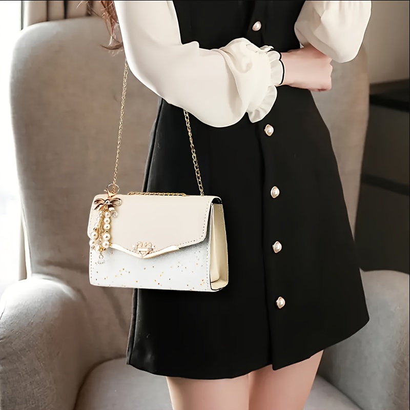 Bolsa transversal para senhora com fecho  8