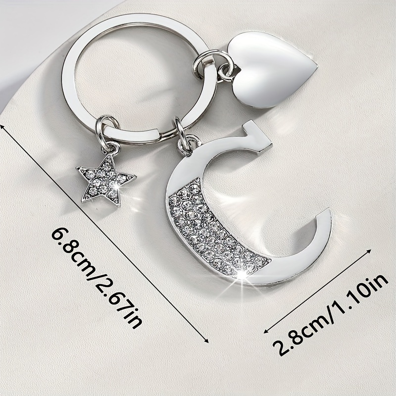 Image of A Fashionable European And Keychain With Water Drill Embellishments In Of English Letters, A Gorgeous Accessory For Ladies' Handbags.